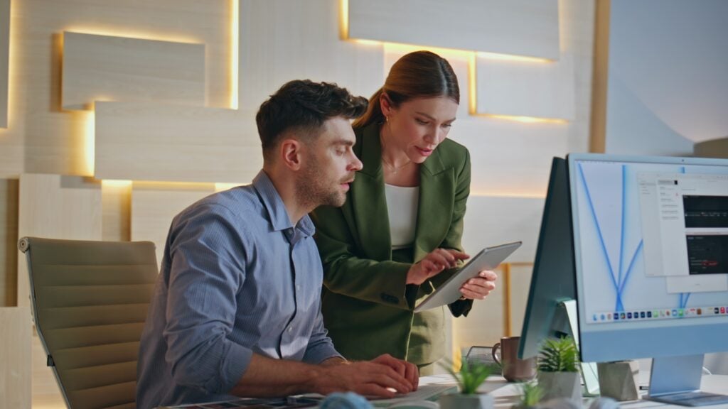 Two managers interacting office working at business project. Happy professionals